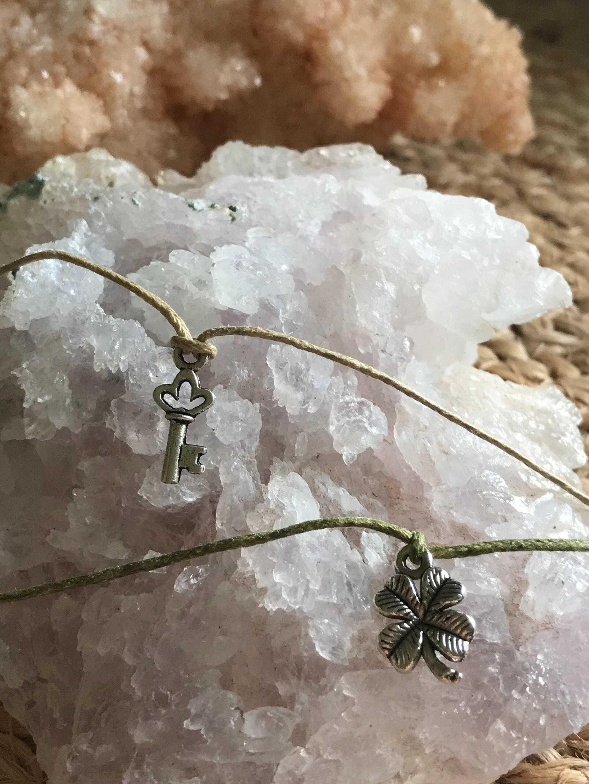 Wishbracelets.co.uk charm bracelets on amethyst flower crystal